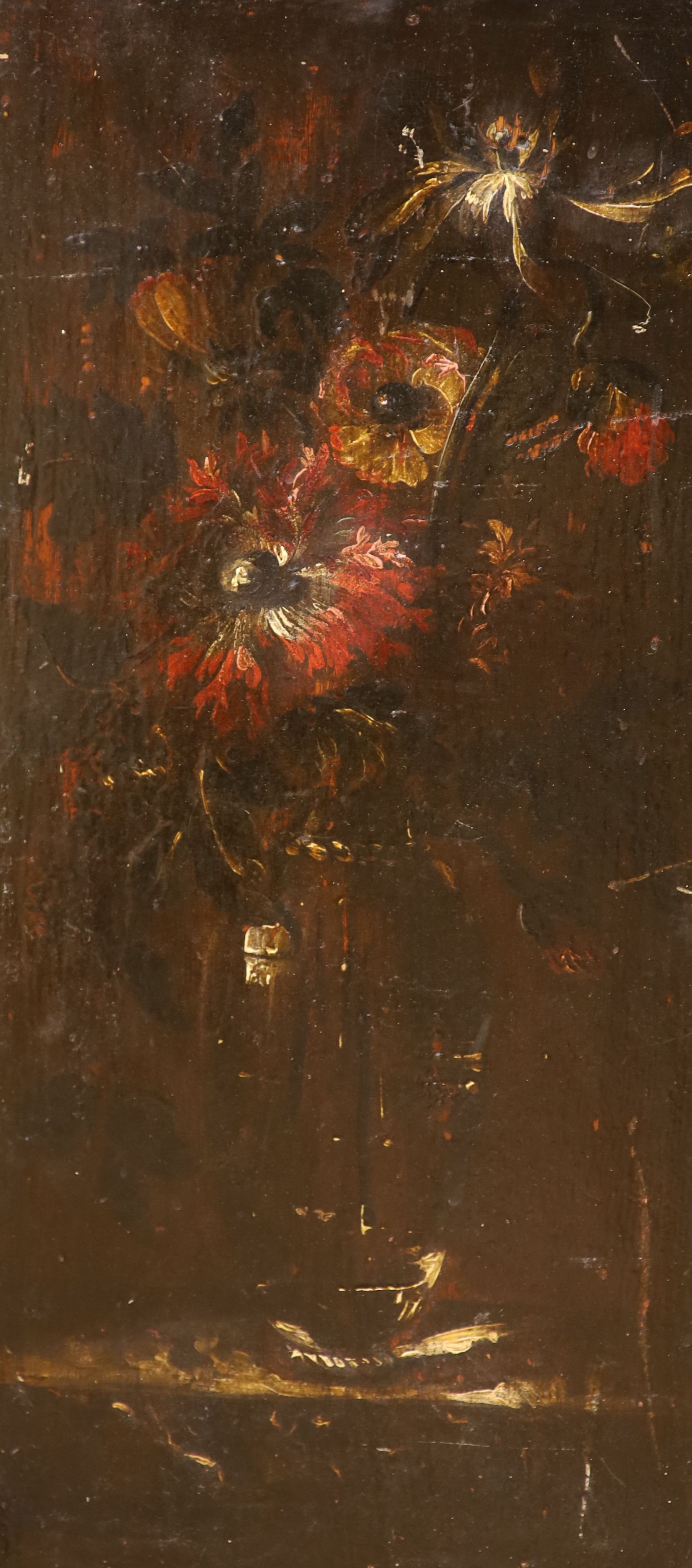 19th century Continental School, oil on wooden panel, Still life of flowers in a vase, 57 x 26cm, unframed